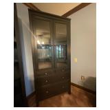 Black cabinet with doors and storage