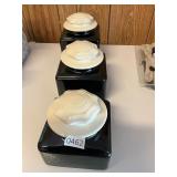 Three-piece, black and white canister set