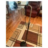 Clear glass globed adjustable floor lamp
