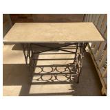 Cast-iron treble base table with marble slab top