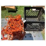 Orange extension cord and crate
