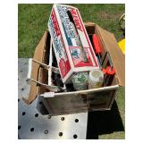 Paint brushes, paint, rollers, plastic sheeting