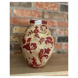 Red and cream ceramic vase