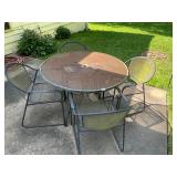 Metal patio table and four chairs
