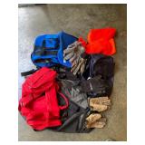 Red bag, blue bag, backpack, gloves, scarf, all