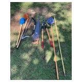 Yard tool lot- shovel, hoe, saws, snip scythe