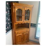 Oak and glass lighted corner hutch