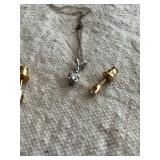 Bag says diamond earrings & necklace