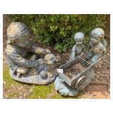 Little boy and dog, / couple with wagon yard decor
