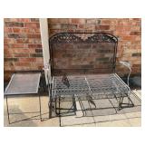 Black wrought, iron, rocking loveseat, and table