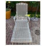 Wrought iron wheeled lounge chair