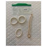 Pearl like necklace and 3 bracelets