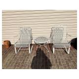 2 wrought iron chairs and table