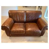 Leather love seat