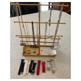 Earrings, necklaces, and stand