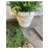 Large concrete planter pot with flower