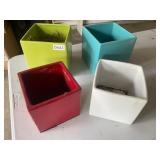 4 colorful square planters