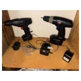 2 cordless drills, both power on
