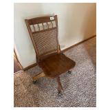 Vintage wooden rolling office chair