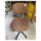 Brown rolling office chair