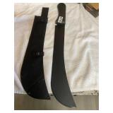 Curved hand held machete