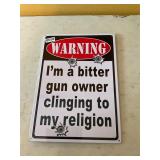Bitter gun owner metal tin sign