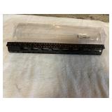 Black free float hand guard. Picatinny rail.