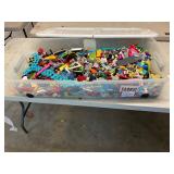 Clear tote full assorted Legos
