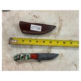 Damascus style knife with leather sheath