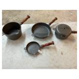 4- cast iron skillets/ pots