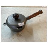 Cast iron pot with wood handle