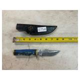 Damascus style knife with leather sheath