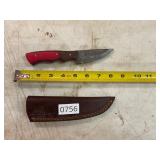 Damascus style knife with leather sheath