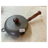 Cast iron pot with wood handle