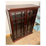 Wooden and glass front cabinet with shelves