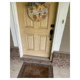 Howdy sign and welcome mat