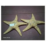 pair of brass star fish wall art