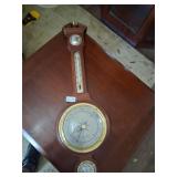 vintage wall-mounted weather station