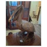 Large hand-carved wooden pelican sculpture