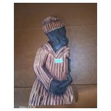 Solid hand carved wood man holding - ghana