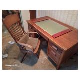 Nice solid antique wooden desk and rolling chair