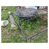 3 random garden tables and cement pillar