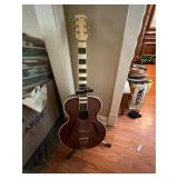 6 string guitar with stand. No name