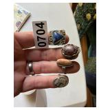 4 assorted rings - stones