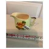Green and yellow flower pitcher