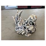 Ceramic blue and white chick statue