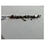 Charm style bracelet
