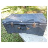 Black plastic storage trunk