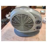 Small grey space heater with fan