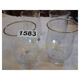Set of 4 gold rimmed winter scene glasses